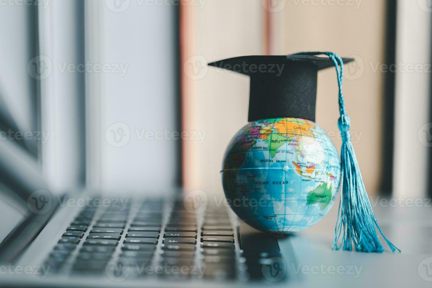 Graduation cap with Earth globe. Concept of global business study, abroad educational, Back to School. Education in Global world, Study abroad business in universities in worldwide. language study photo