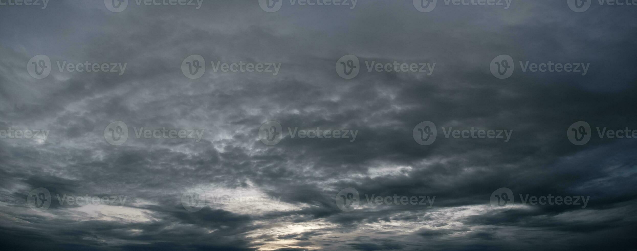 black cloud rainstorm in the vast sky photo