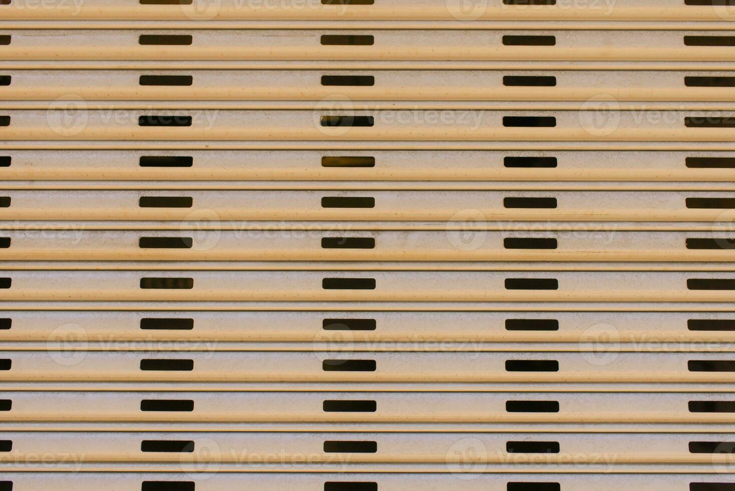 The walls are paneled in beige stripes. Background of city building elements. photo