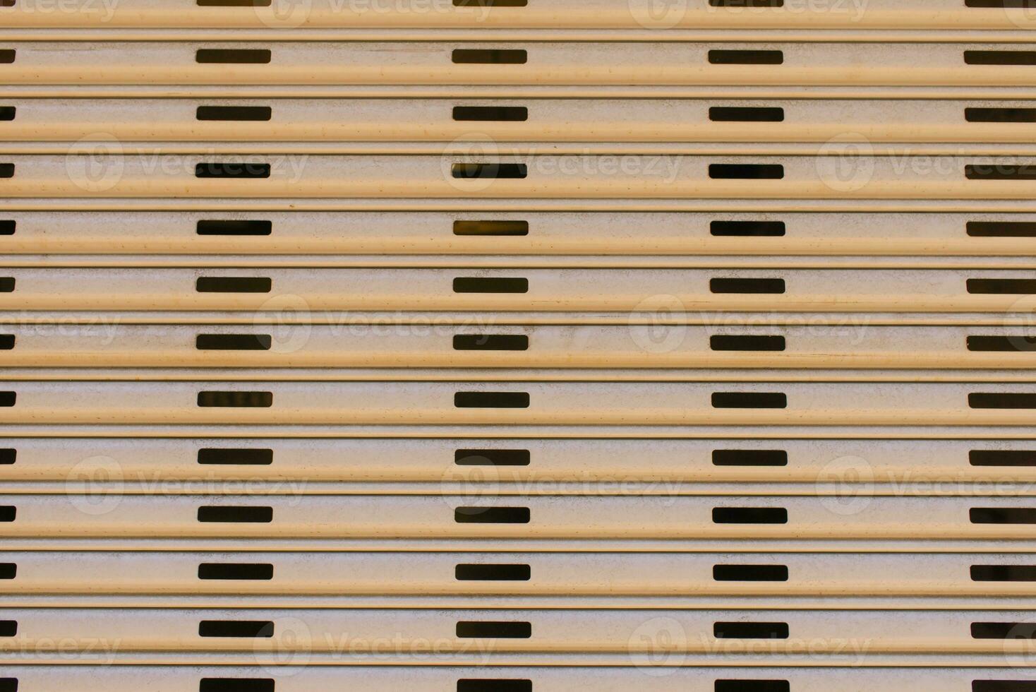 The walls are paneled in beige stripes. Background of city building elements. photo