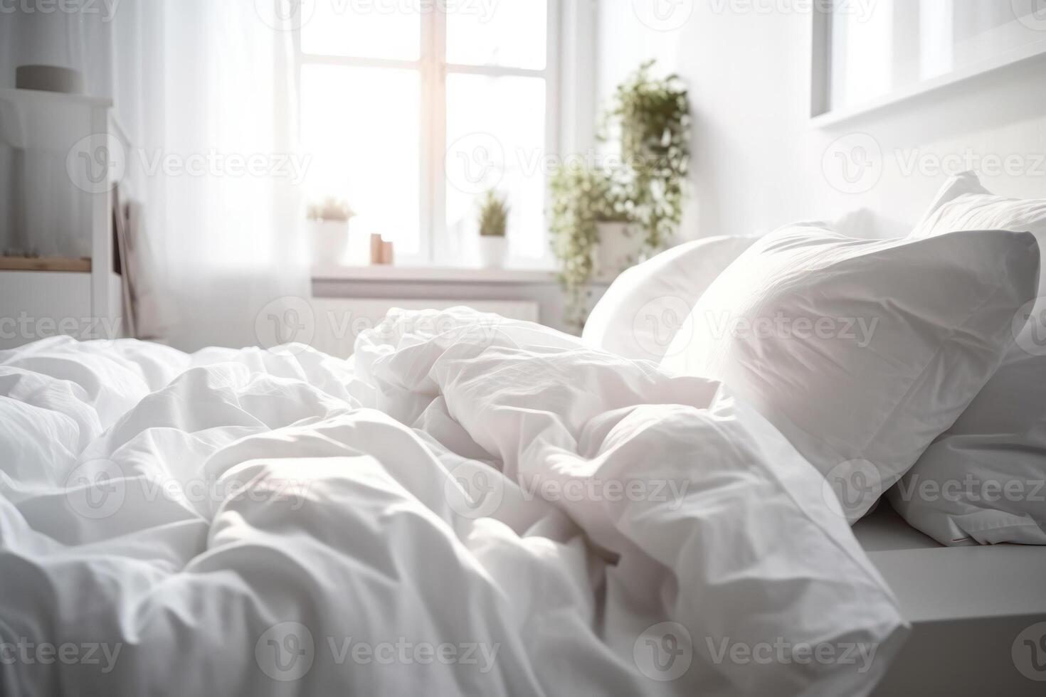 morning white bed in the bedroom illuminated by sunlight photo