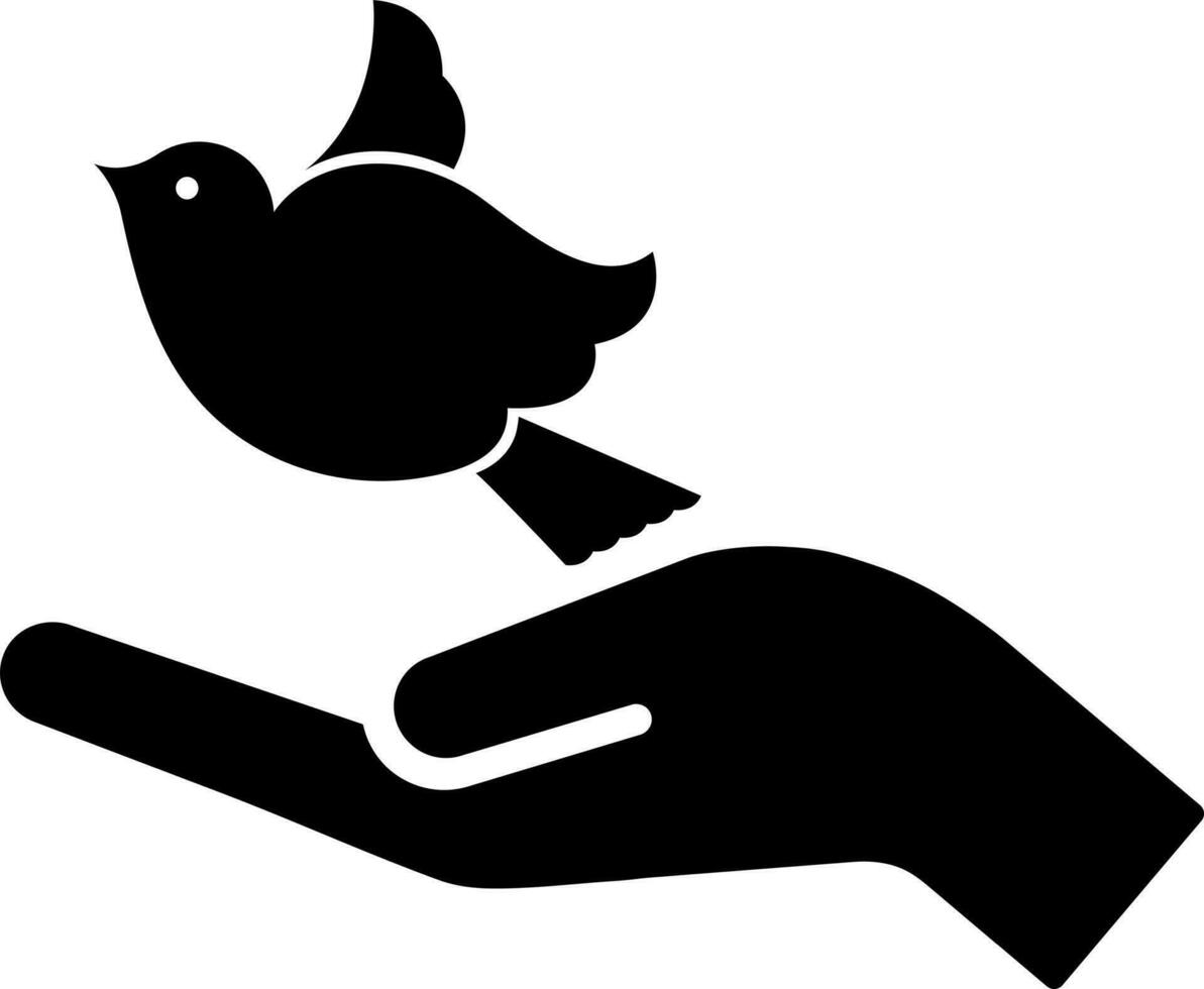 Human hand with bird fly or freedom glyph icon. vector