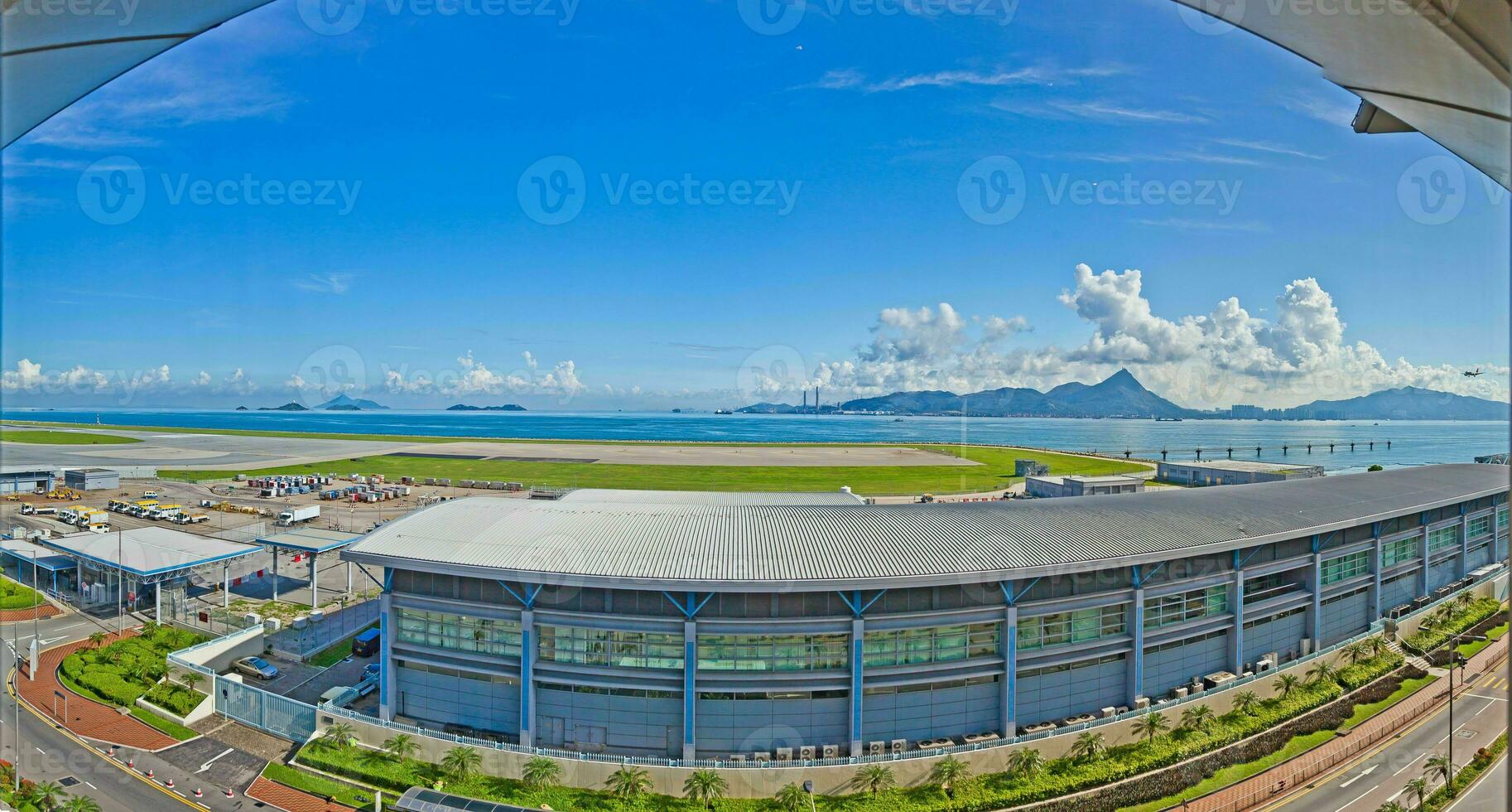 View from the terminal of the airport in Hong Kong over the airfield and the bay photo