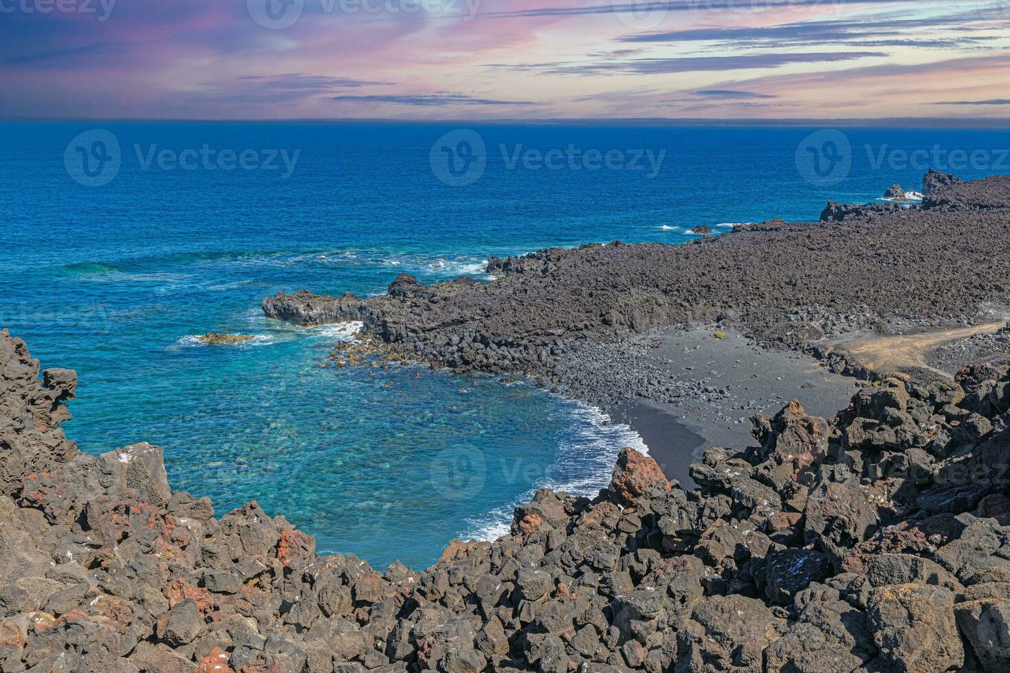 Picture over the black beach Playa del Paso near El Golfo on Lanzarote photo