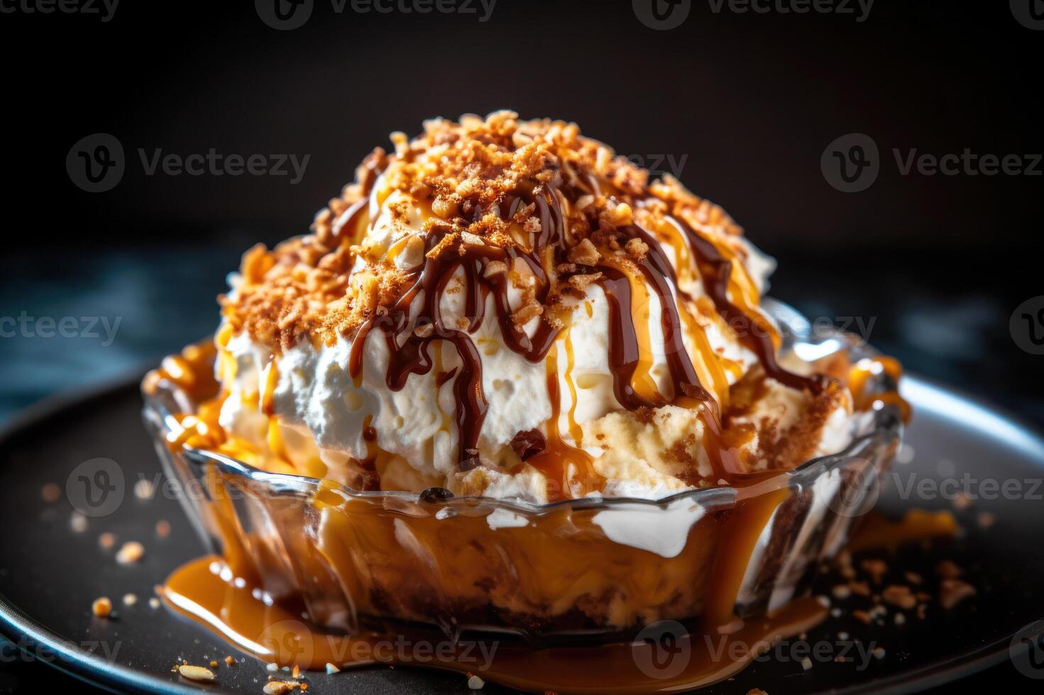 ice cream with caramel, nuts and chocolate photo