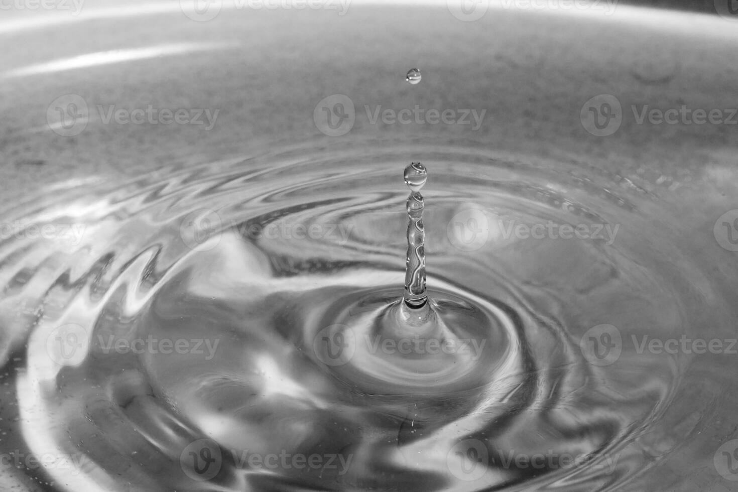 falling drops in water photo