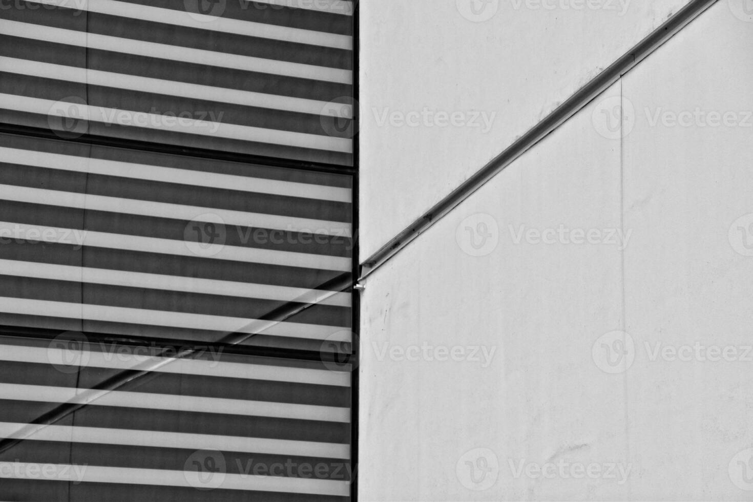 modern original fragments of architecture against the blue sky creating an interesting background photo