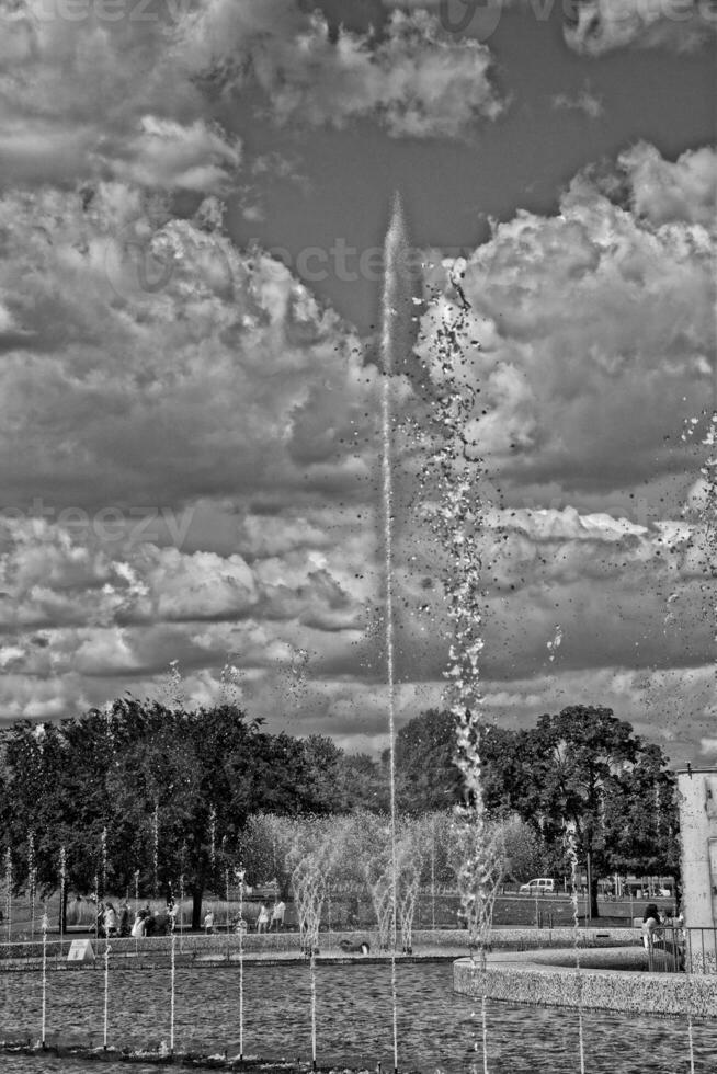 large fountain on a warm summer day in Warsaw in Poland photo