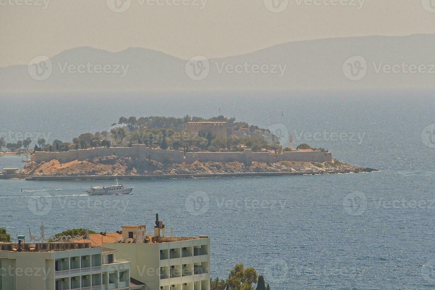 Turkish port city of Kusadasi on the Mediterranean Sea on a warm summer sunny day, photo