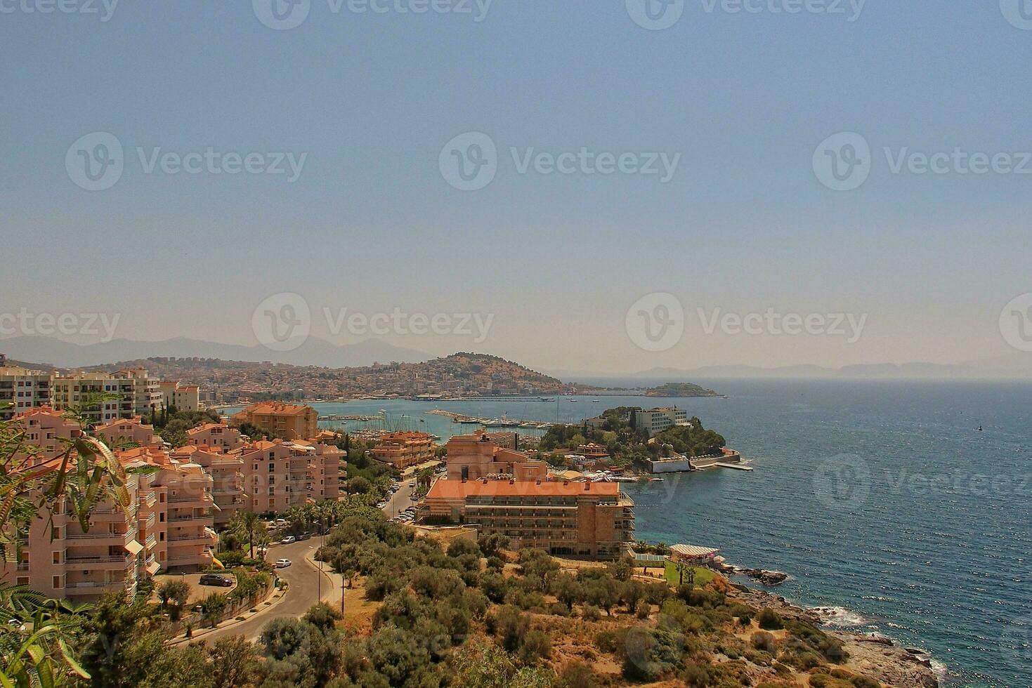 Turkish port city of Kusadasi on the Mediterranean Sea on a warm summer sunny day, photo