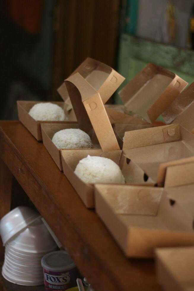 order rice box in large quantities. brown food box photo