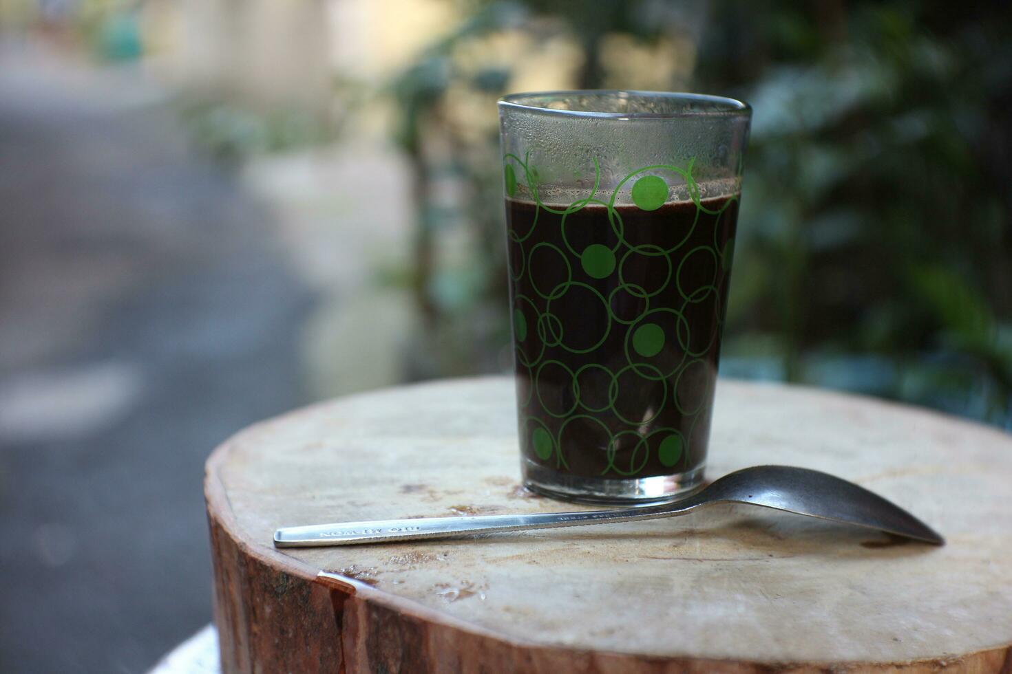 black coffee with transparent glass cup. photo