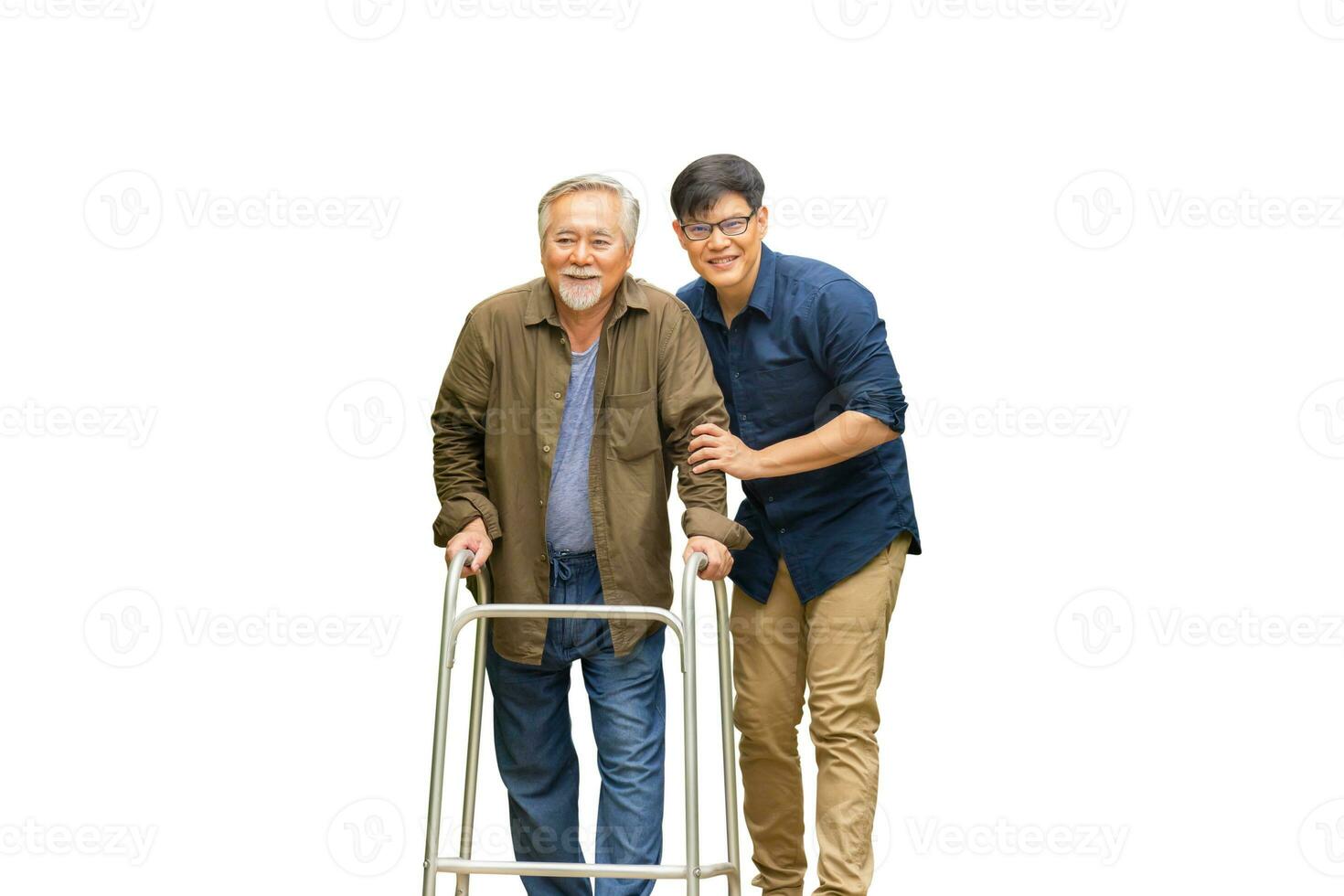 Senior asian father and middle aged son with clipping path, Caregiver is teaching old man to walk with walker, Elderly senior man with son on white background photo
