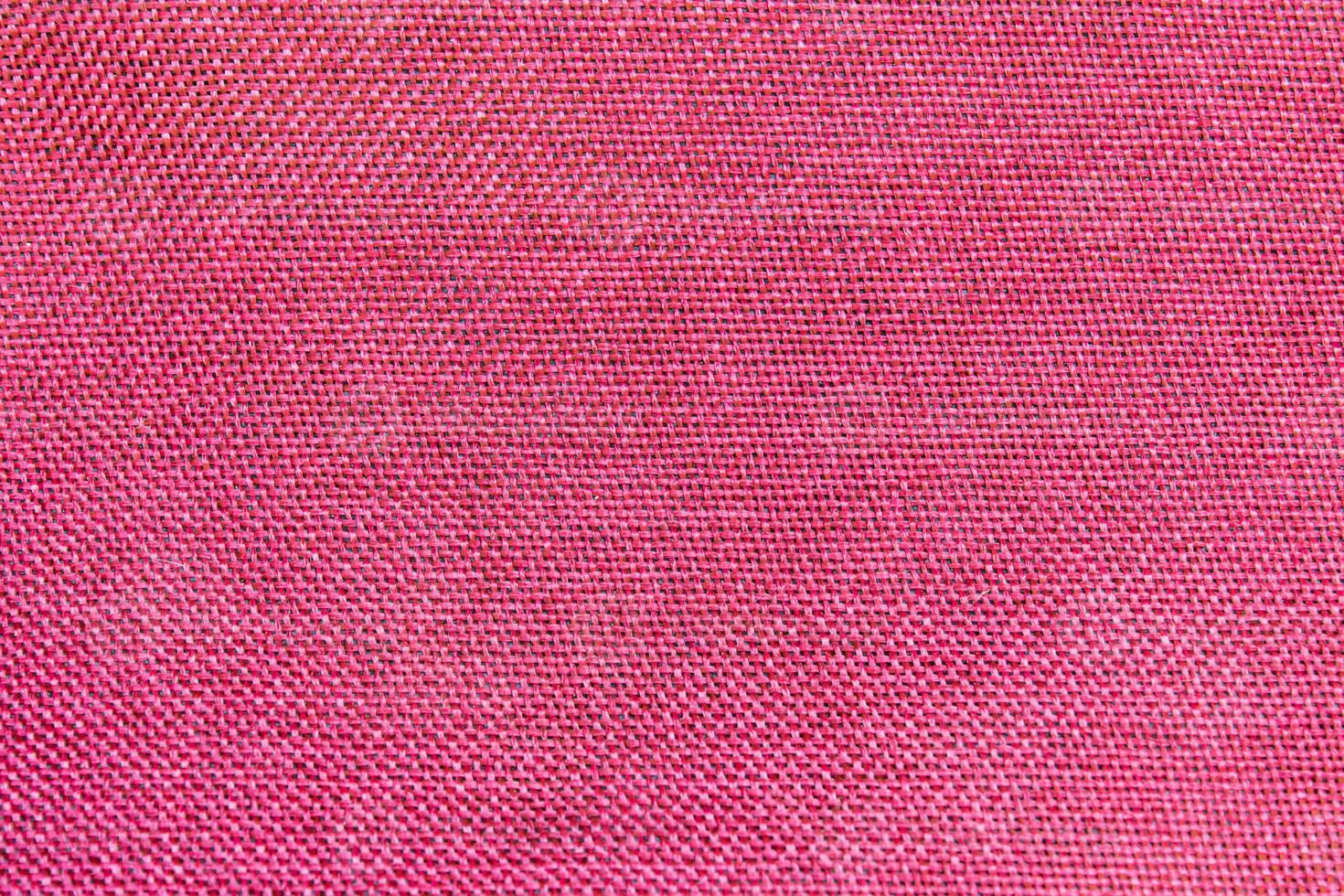 de cerca de rojo textil textura, rojo tela para antecedentes y fondo de pantalla. foto