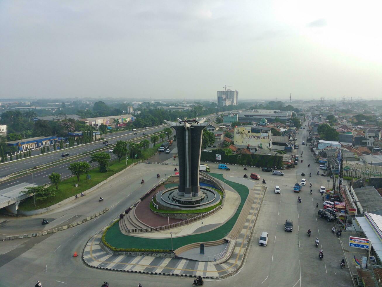 Bogor, Indonesia - 2022. aerial view of Tugu Pancakarsa in the morning at the crossroads photo