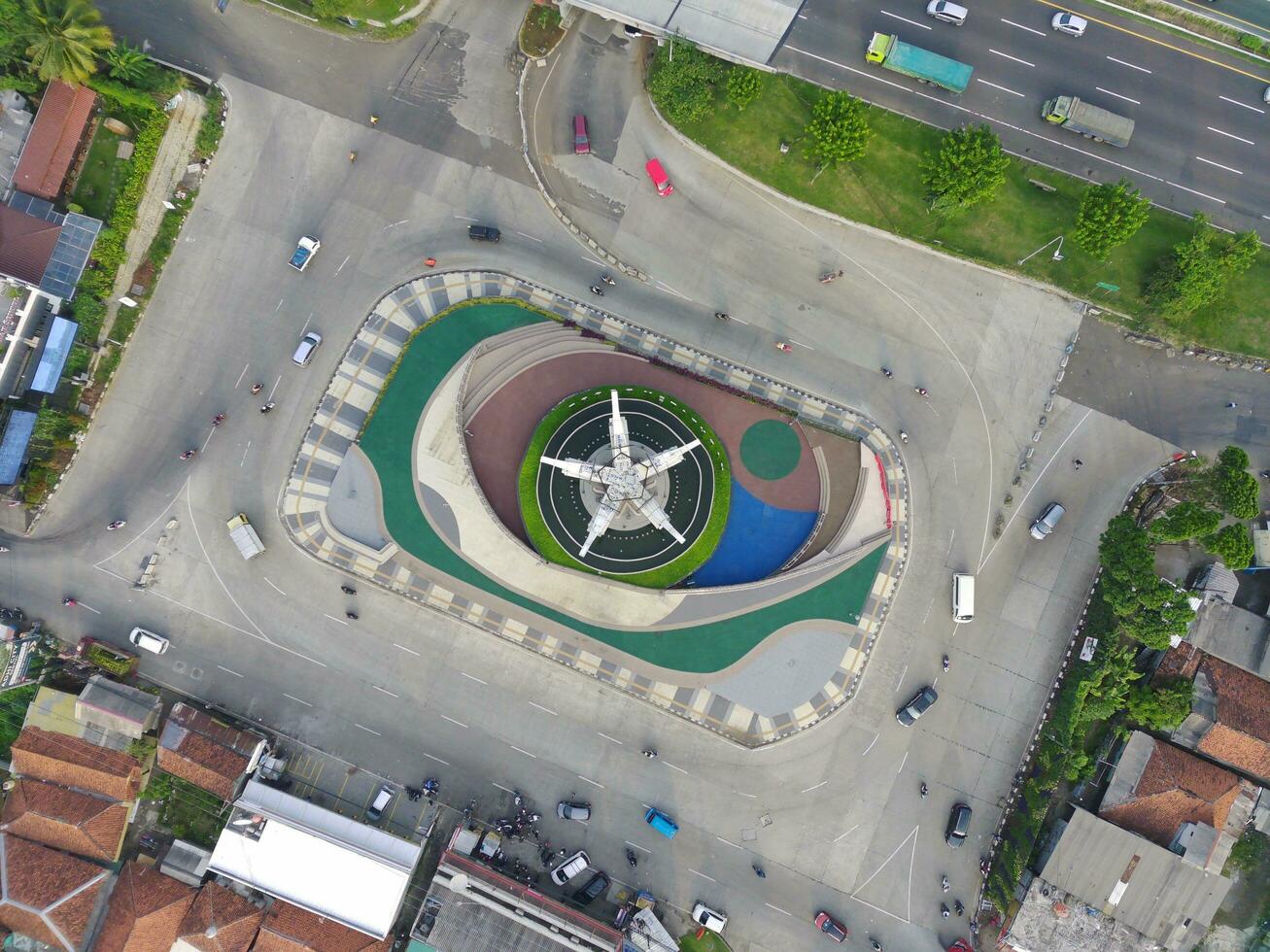 Bogor, Indonesia - 2022. aerial view of Tugu Pancakarsa in the morning at the crossroads photo