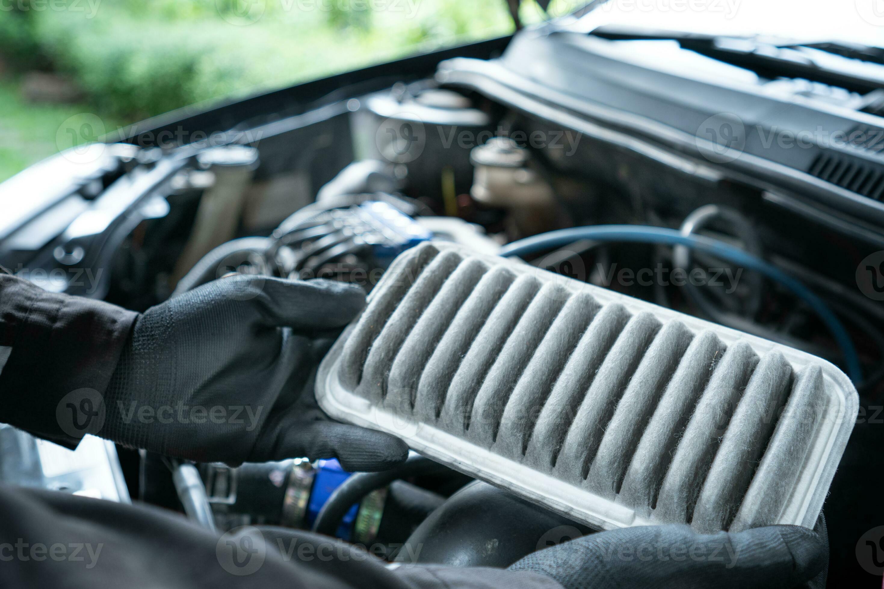 Concept of car care service maintenance, the car air filter is old and