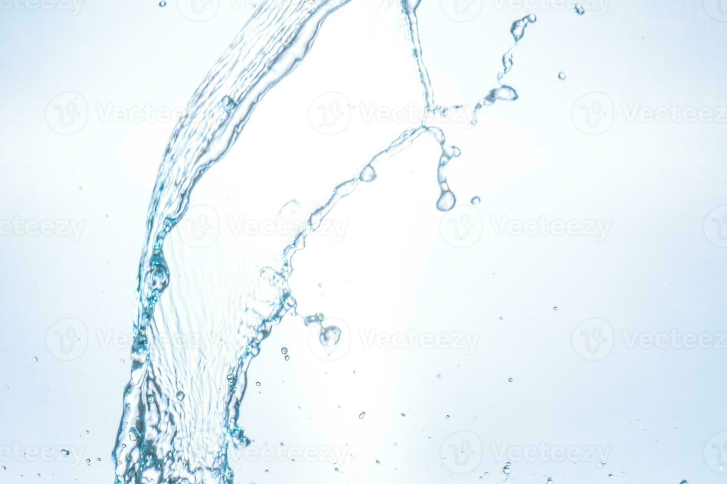 splashing water droplets on a white background photo