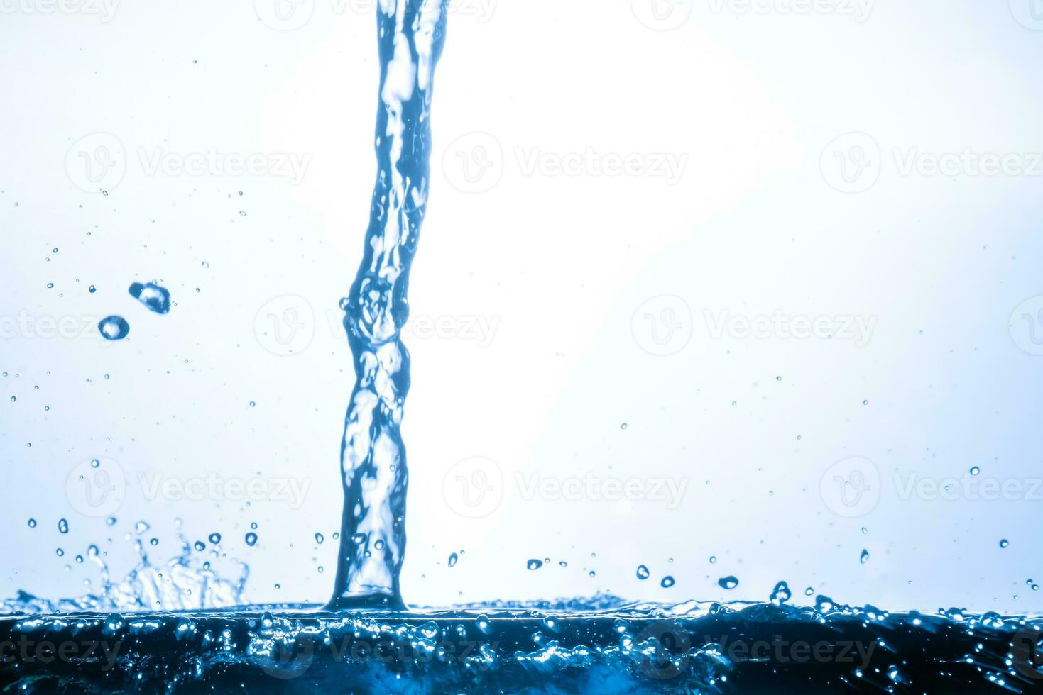 splashing water droplets on a white background photo