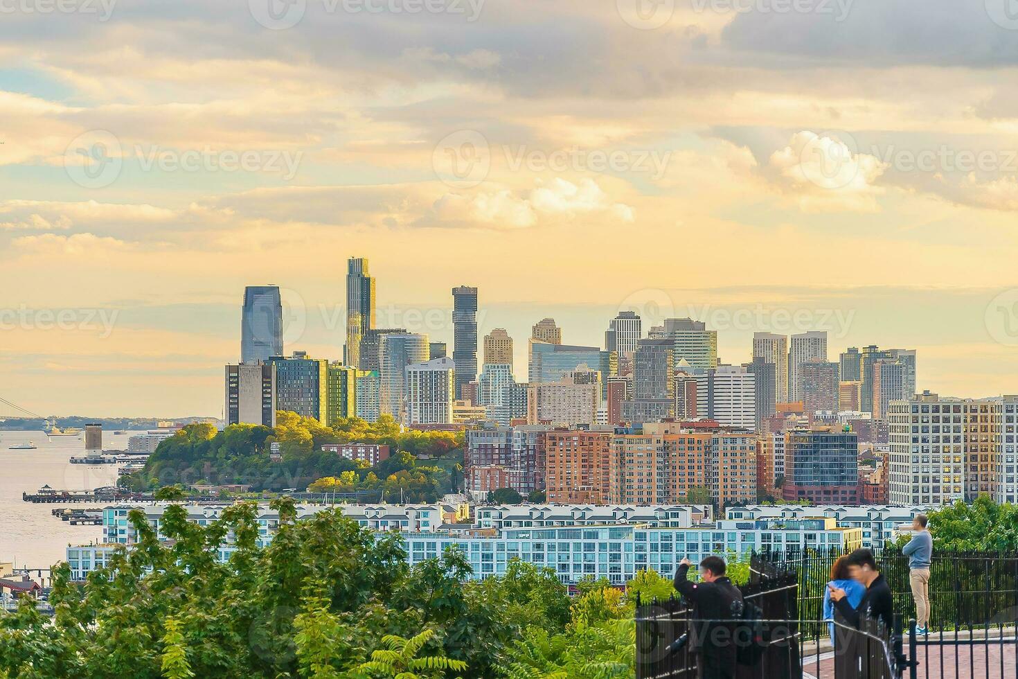 Cityscape of Jersey City skyline  from Manhattan NYC photo