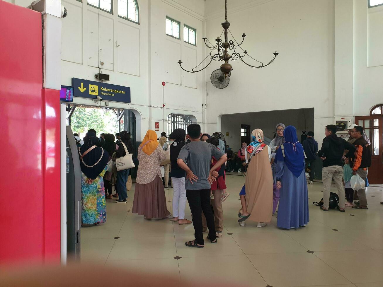 Tegal, May 2023. The atmosphere at Tegal train station was full of people queuing to check their tickets to get into the train carriages in the morning. photo