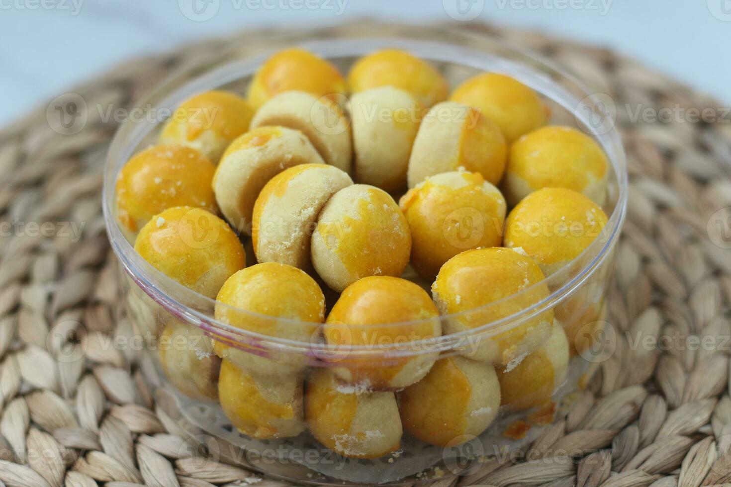 nastar cookies, pineapple tarts or nanas tart are small, bite-size pastries photo