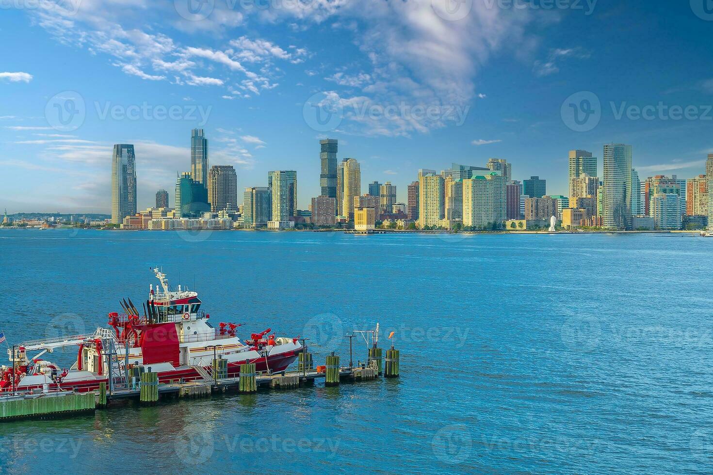 Cityscape of Jersey City skyline  from Manhattan NYC photo