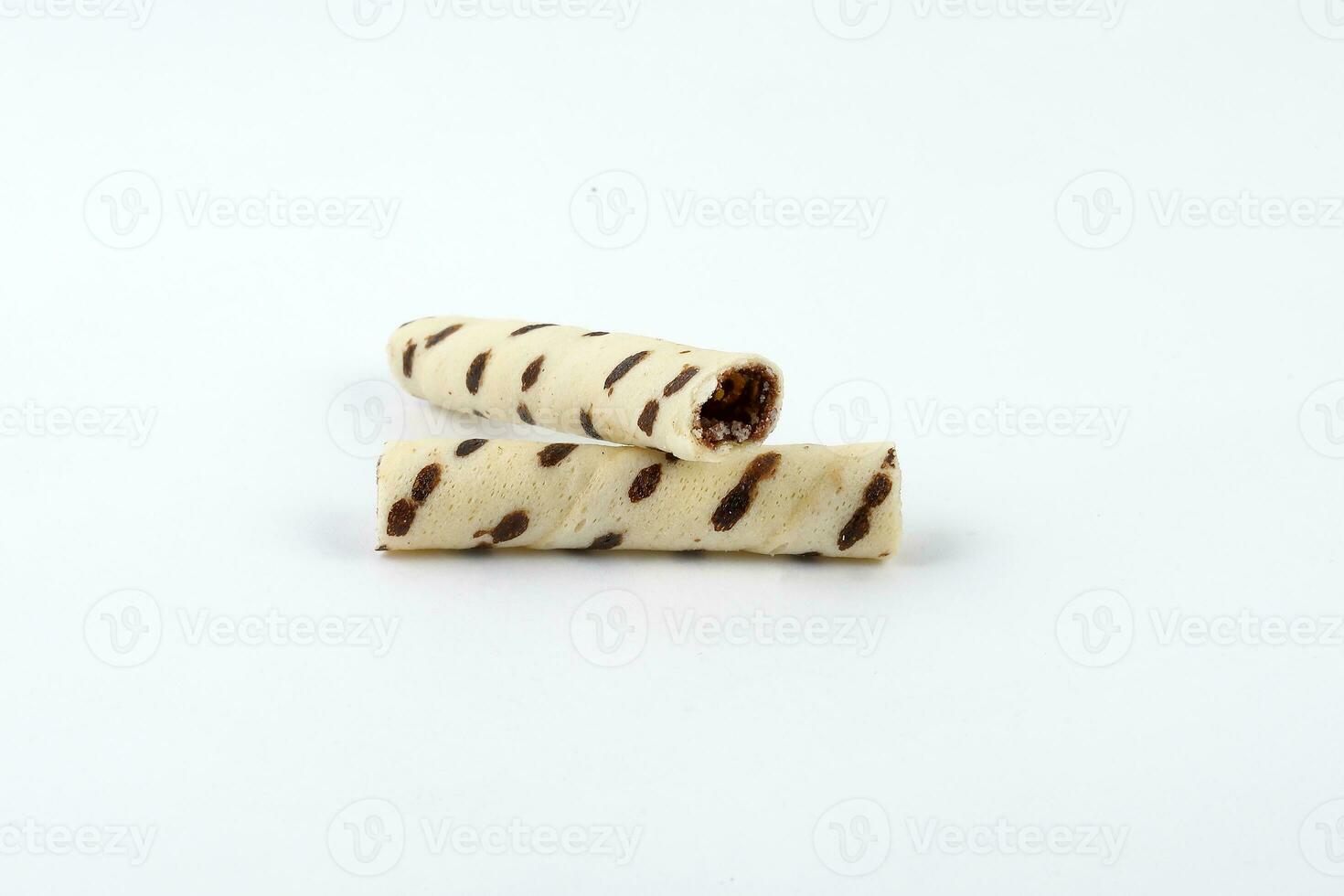 Mini Chocolate vanilla waffle tube biscuit on white background photo