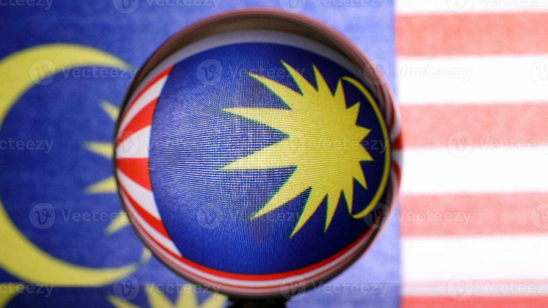 Malaysian flag refraction through glass crystal ball country independence patriot concept photo