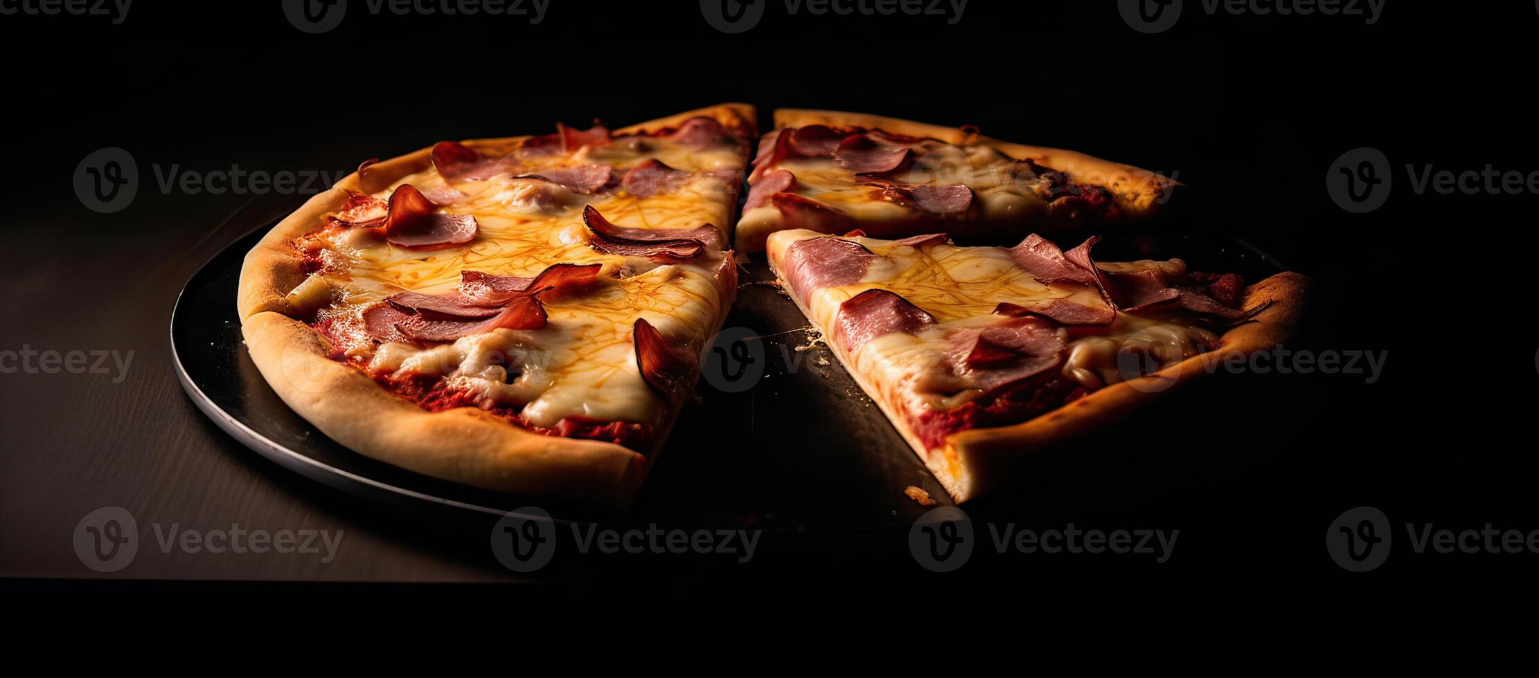 Tasty pepperoni pizza and cooking ingredients tomatoes basil on black concrete background. Top view of hot pepperoni pizza. With copy space for text. Flat lay. Banner. . photo