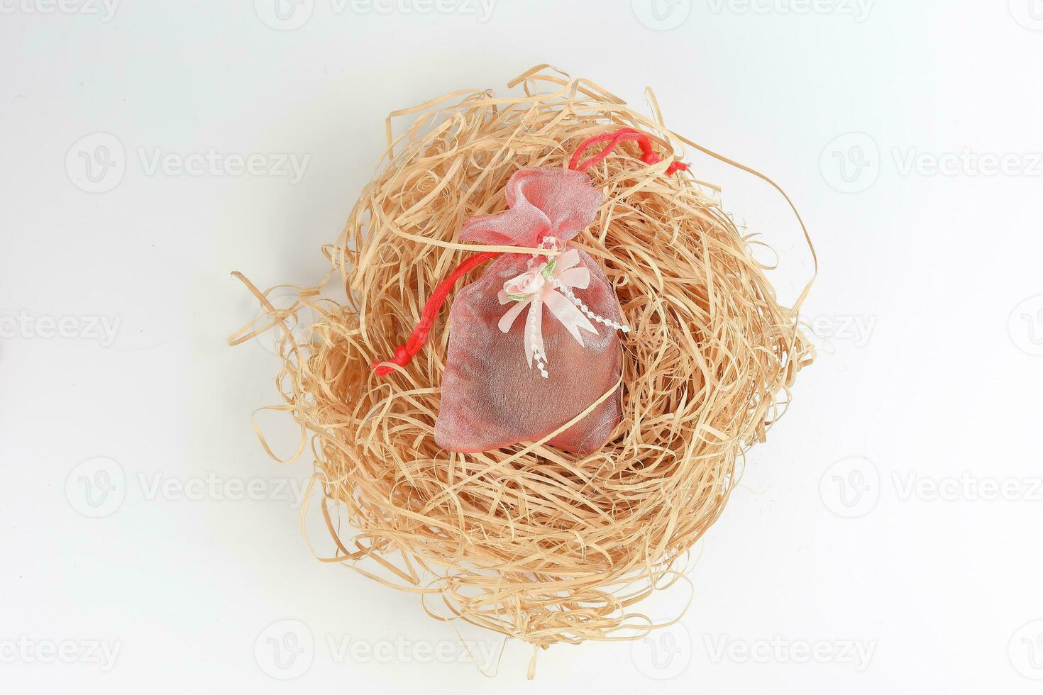 Egg flower or bunga telur a traditional malay wedding gift important part of reception door gift in straw bird nest photo