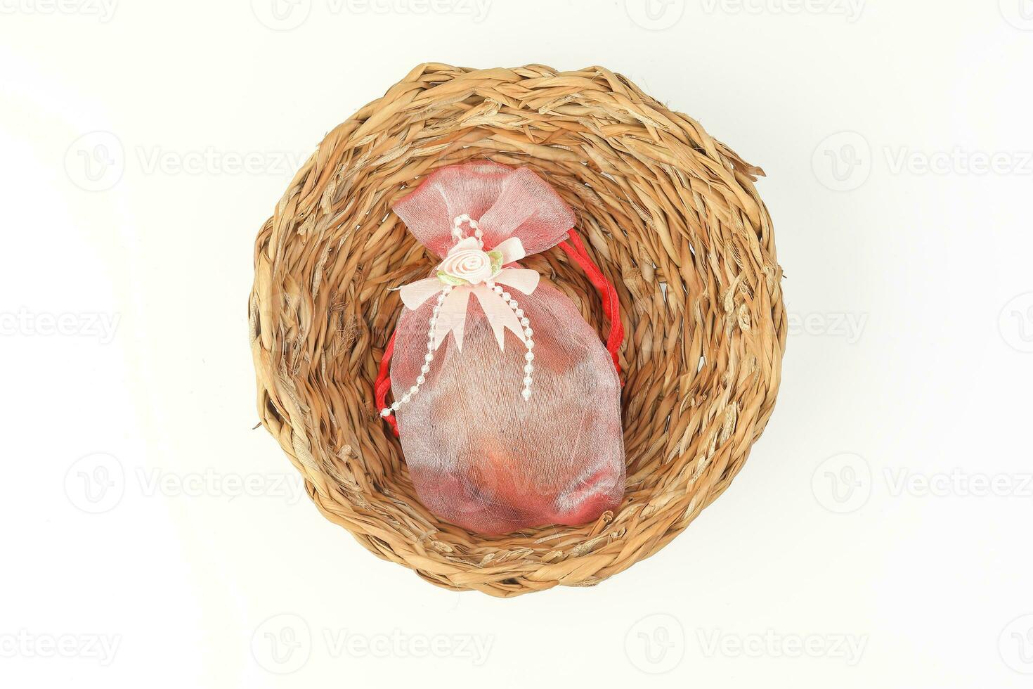 Egg flower or bunga telur a traditional malay wedding gift important part of reception door gift in straw basket photo