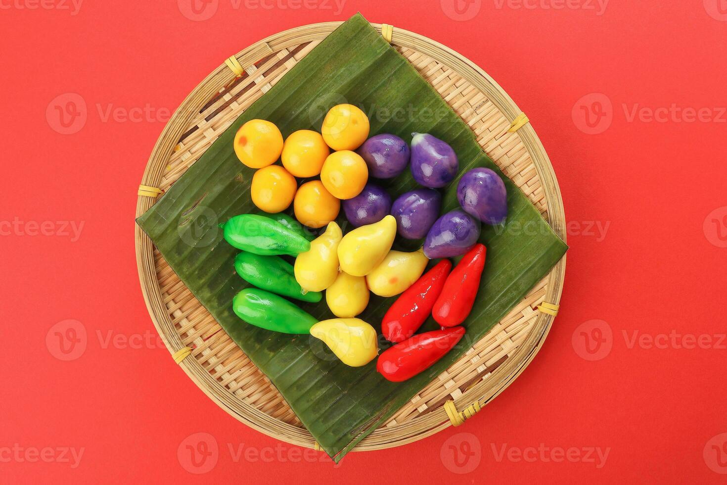 Colourful Luk chup look choop tadeonal Thai desert sweets candy creatve variety bamboo plate banana leaf photo
