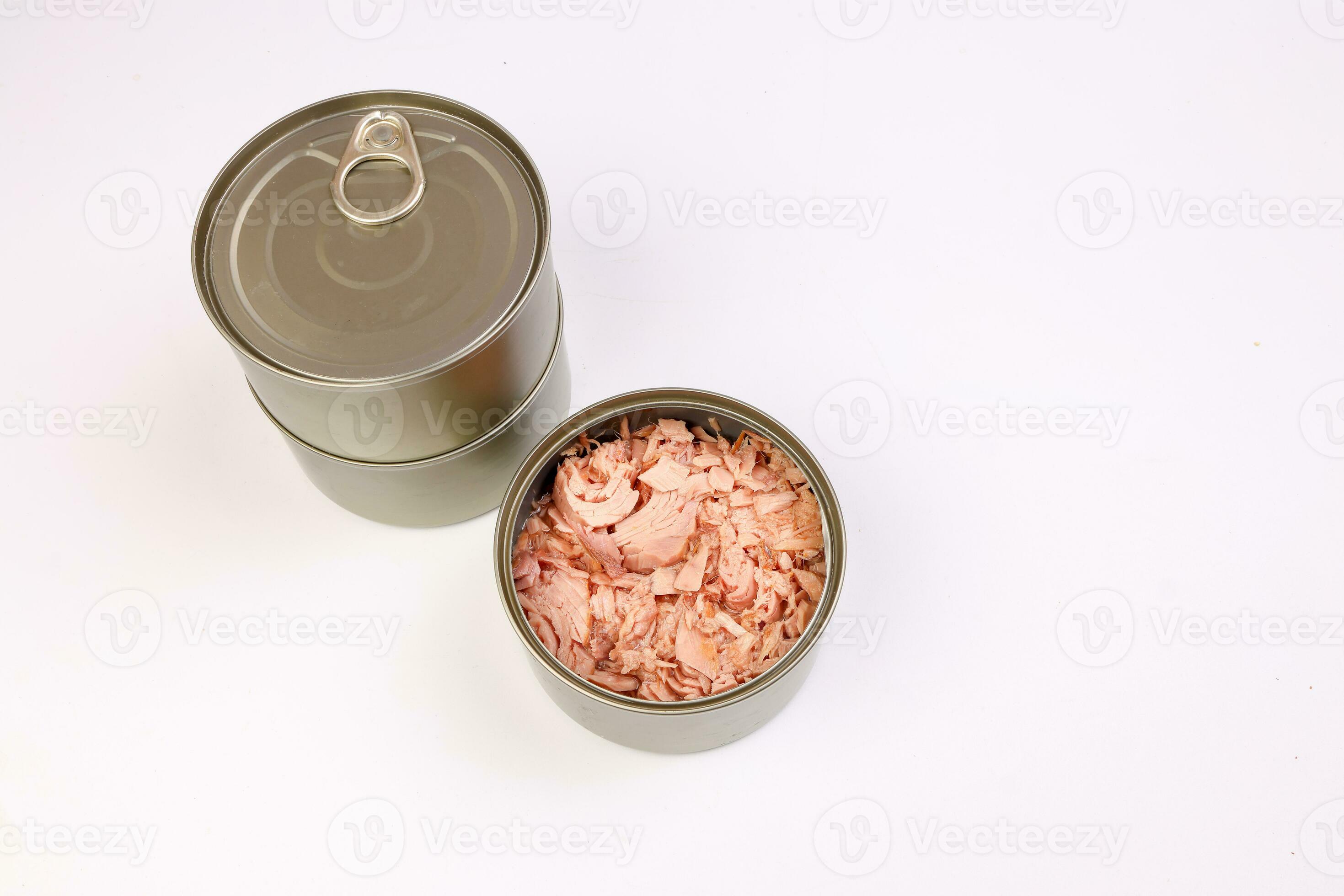 Tuna fish meat flaky chunk in tin can on white background 24312678 Stock Photo at Vecteezy
