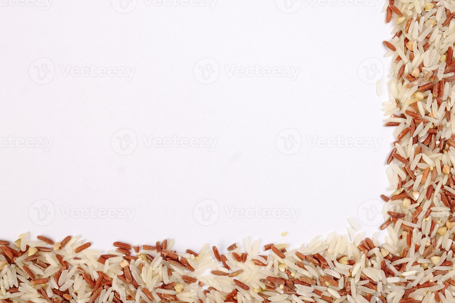 Mixed low glycaemic index healthy rice grain basmati millet buckwheat red rice border frame copy text space on white background photo