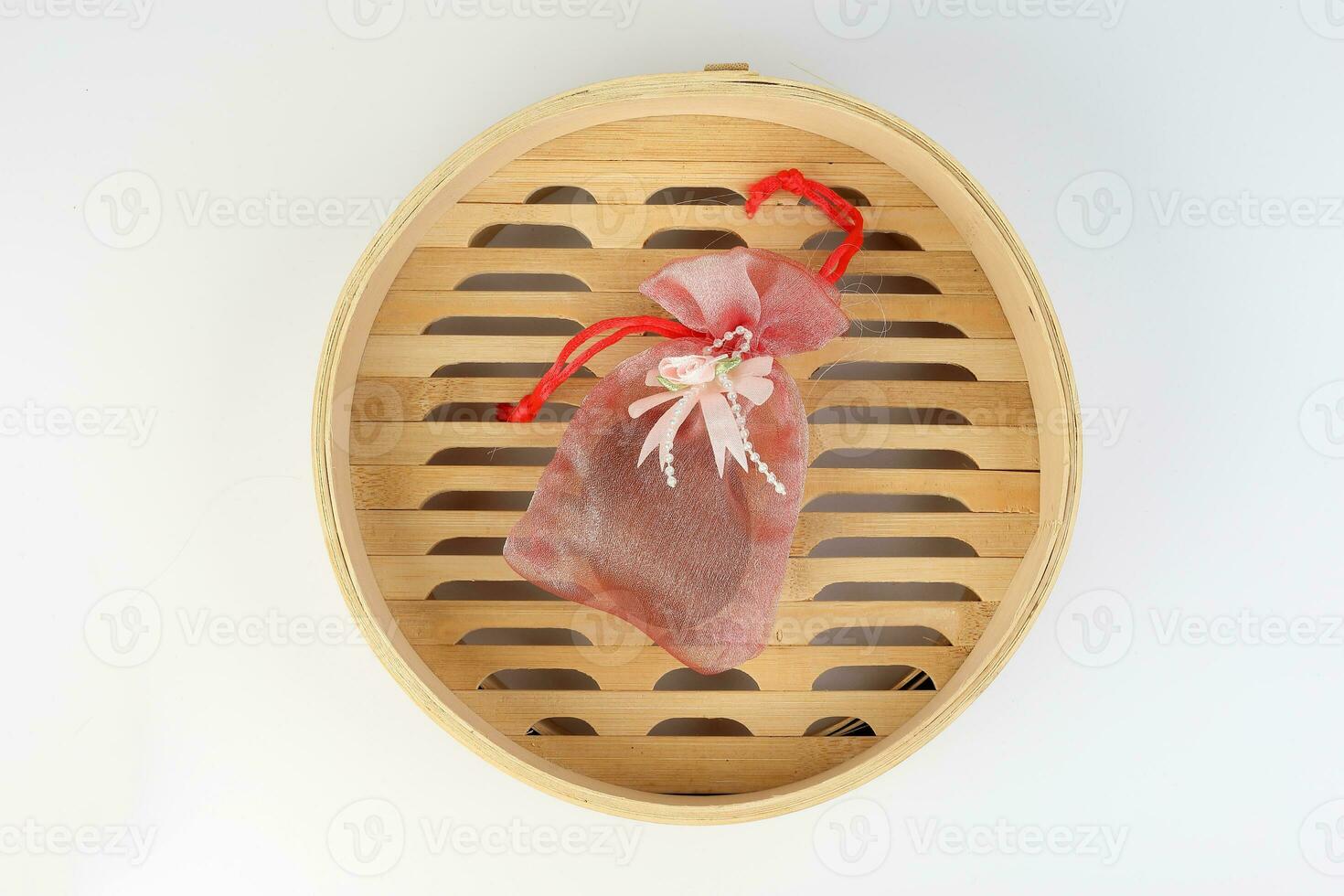 Egg flower or bunga telur a traditional malay wedding gift important part of reception door gift in bamboo steamer photo