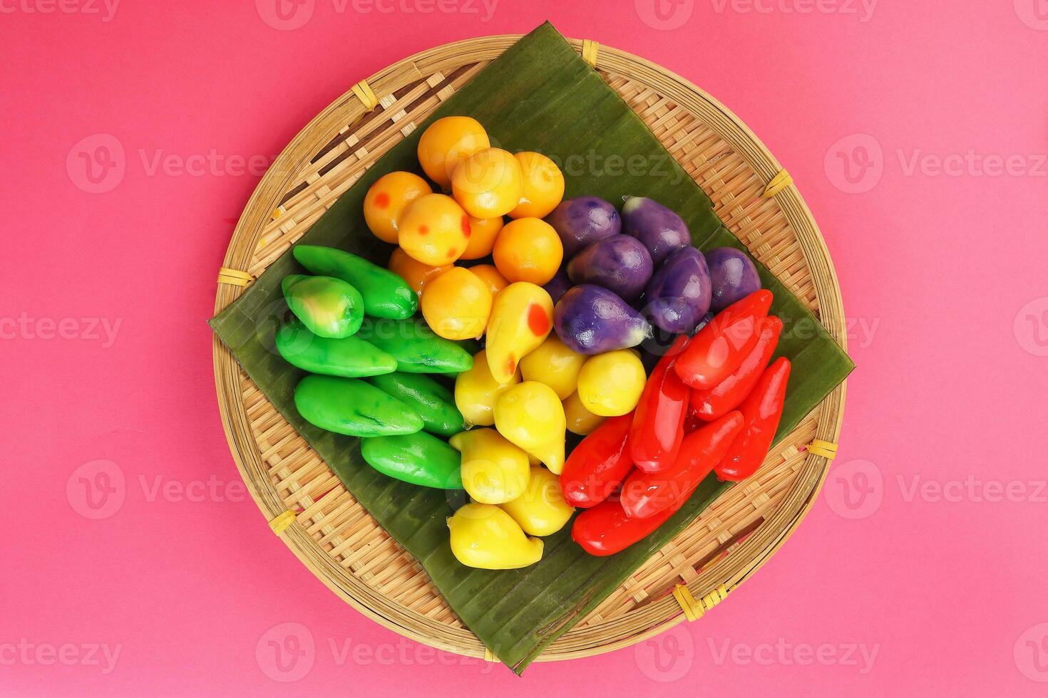 Colourful Luk chup look choop tadeonal Thai desert sweets candy creatve variety bamboo plate banana leaf photo