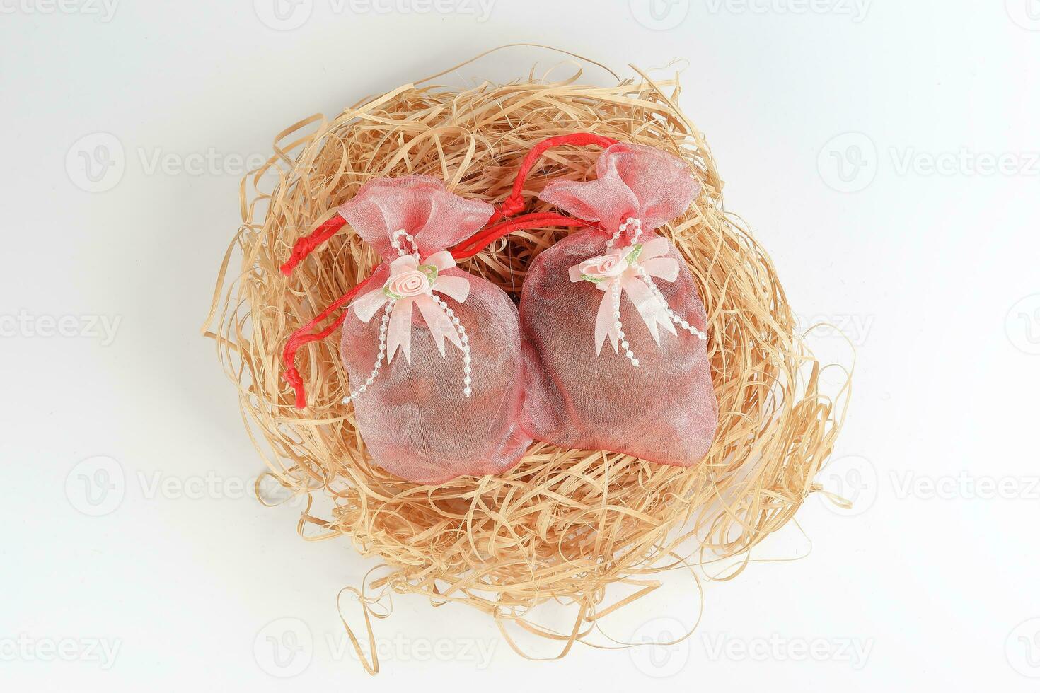 Egg flower or bunga telur a traditional malay wedding gift important part of reception door gift in straw bird nest photo