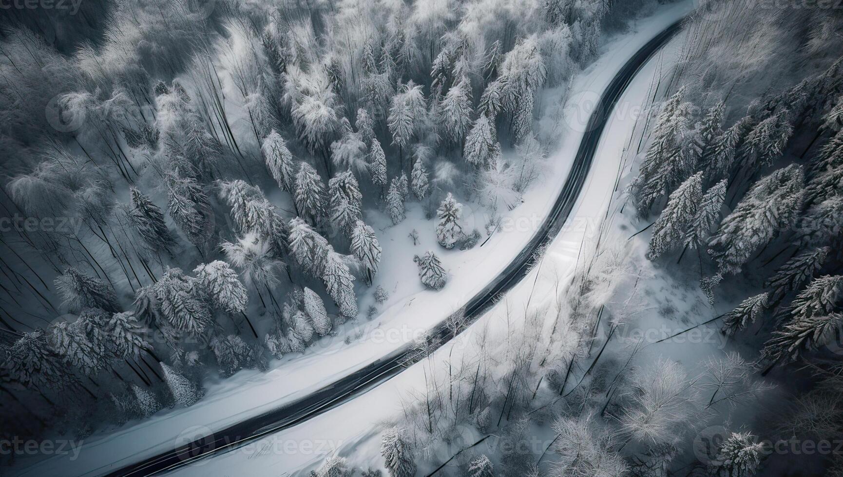 Aerial view on the road and forest at the winter time. Natural winter landscape from air. Forest under snow a the winter time. . photo