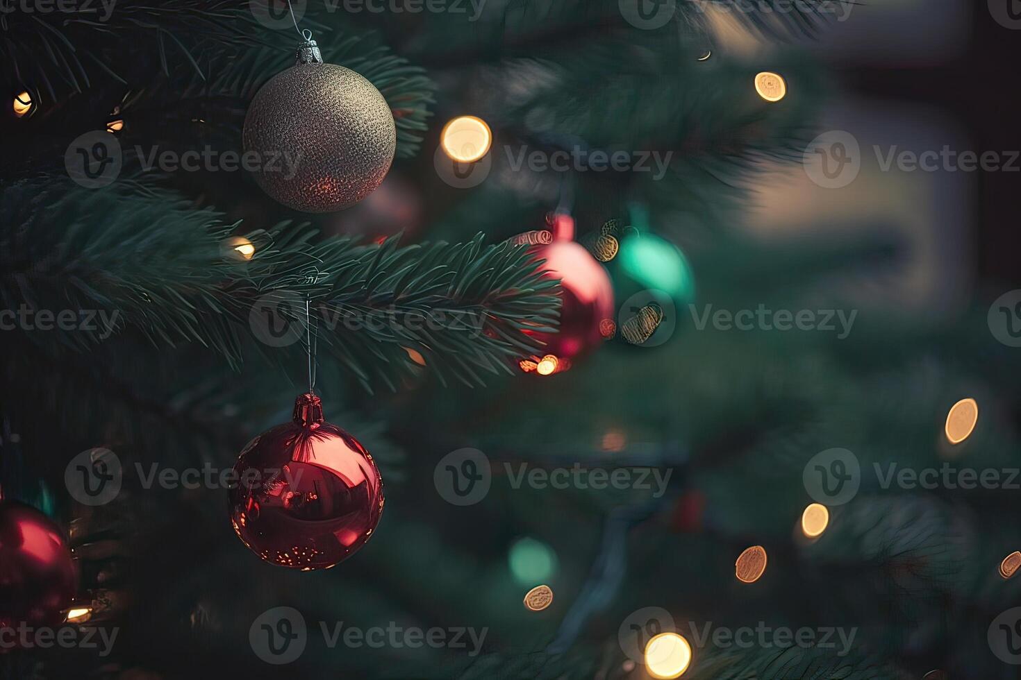 Close up view of beautiful fir branches with shiny colorful bauble or ball, xmas ornaments and lights, christmas holidays background. . photo