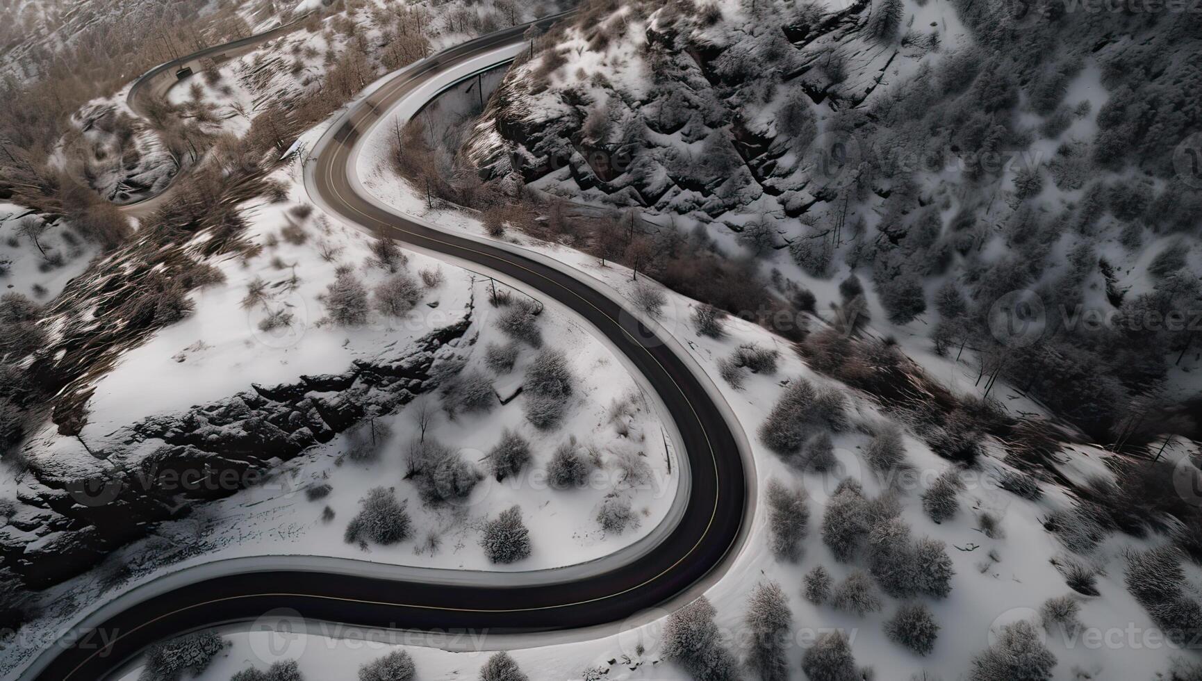Aerial view on the road and forest at the winter time. Natural winter landscape from air. Forest under snow a the winter time. . photo