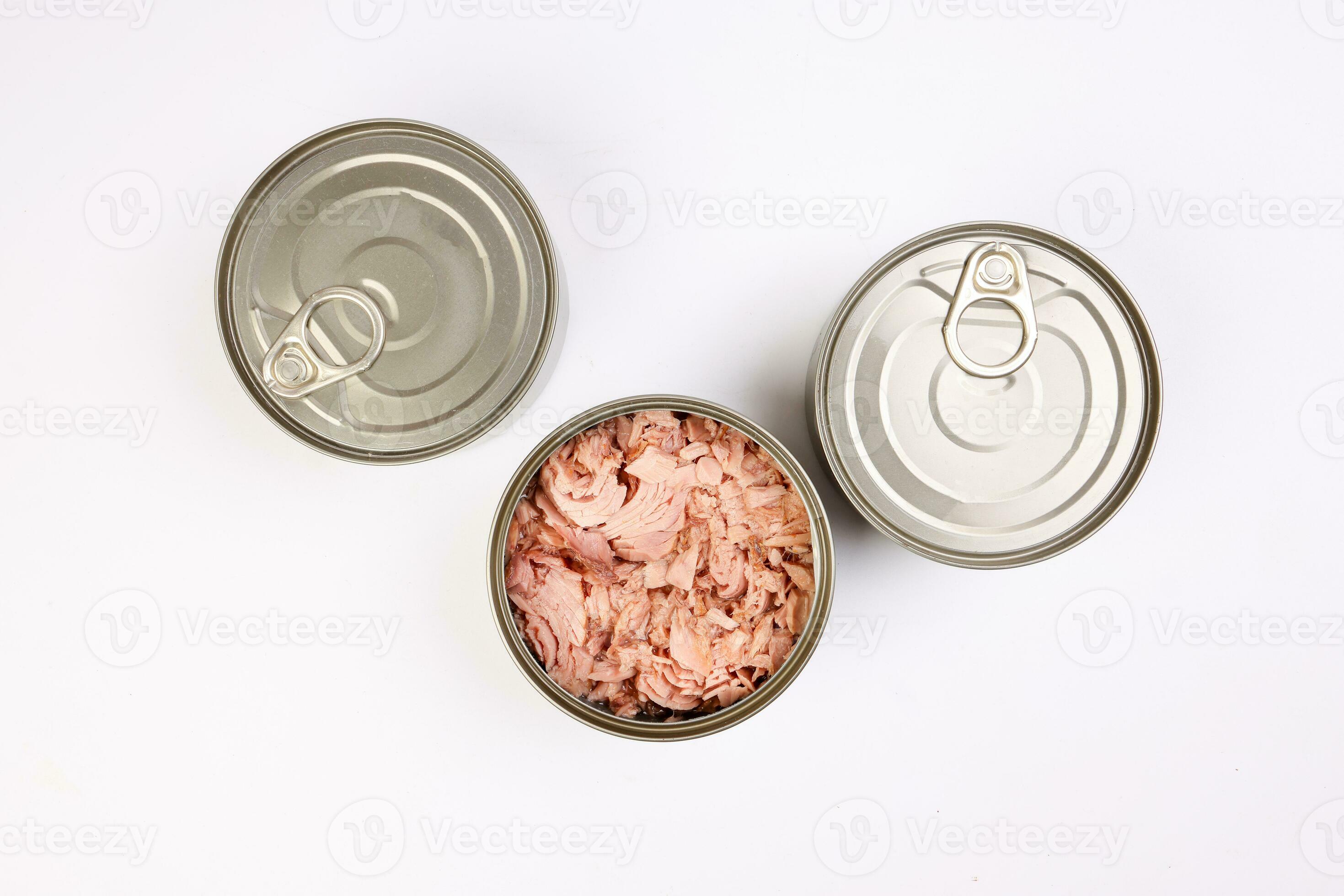 Tuna fish meat flaky chunk in tin can on white background 24316253 Stock Photo at Vecteezy