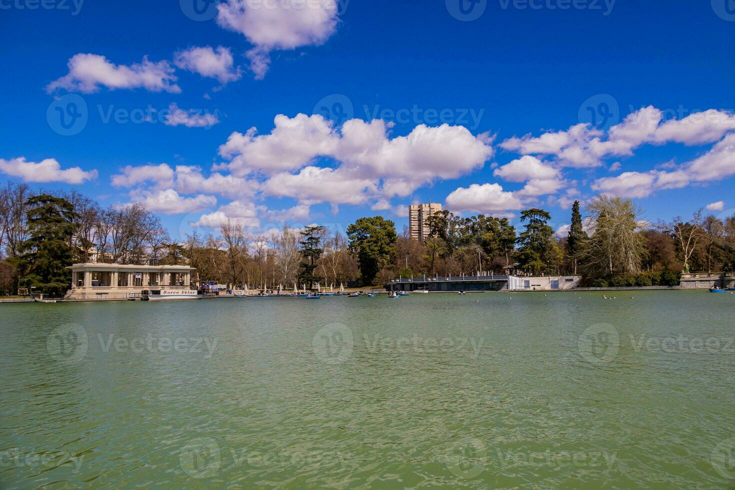 madrid park retiro spring landscape with water photo