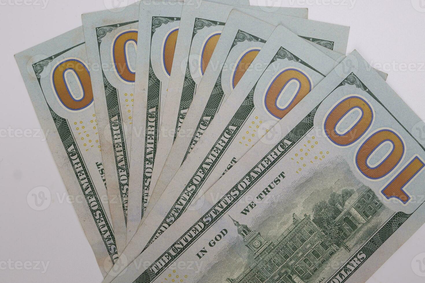 US Dollar currency paper money 100 Hundred dollar bill on white background photo