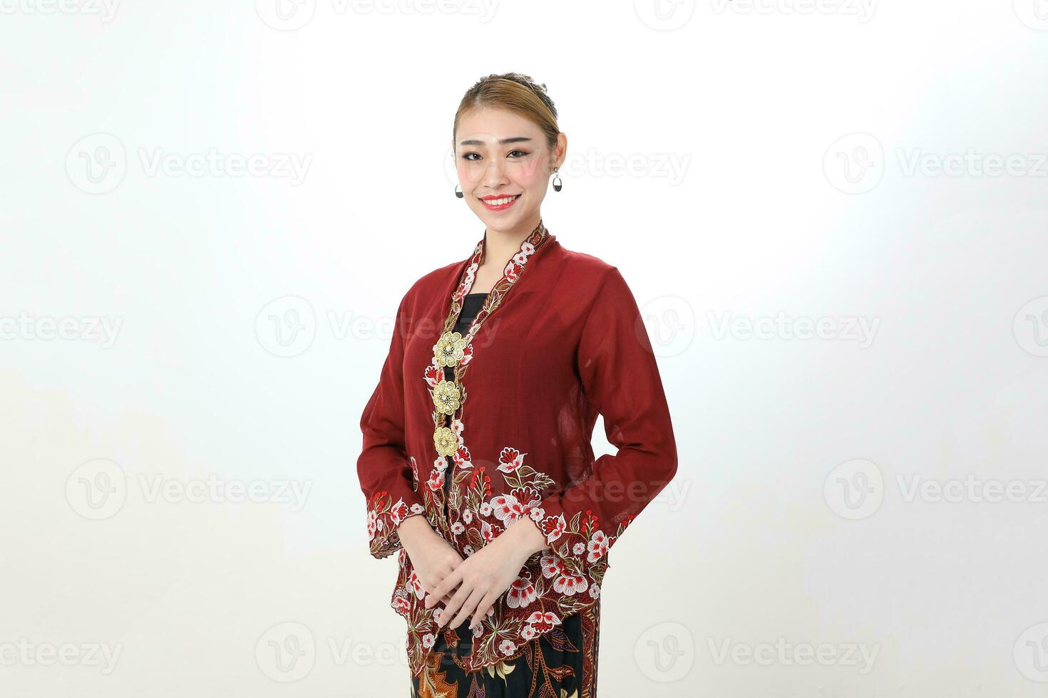 Asian woman traditional red maroon kebaya sharong on white background happy smile photo