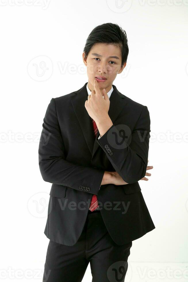 South East Asian young Chinese man wearing formal business office ware on white pose hand on cheek photo