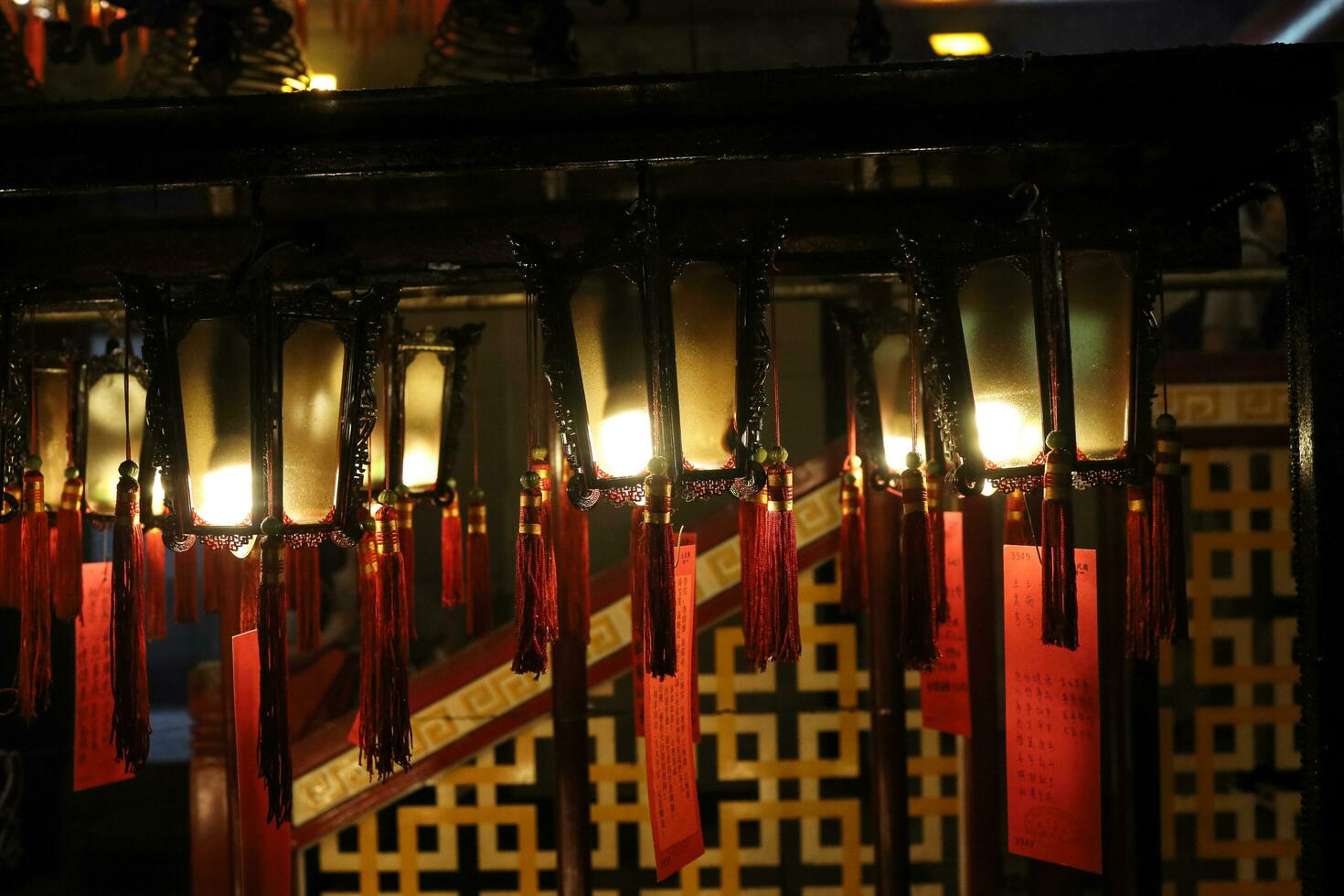 Hong Kong, Central-January 25, 2020  Devotees at Man Mo Temple for offerings and prayers for Chinese New Year.  In mist of protest and Novel coronavirus, 2019-nCoV, COVID-19. photo