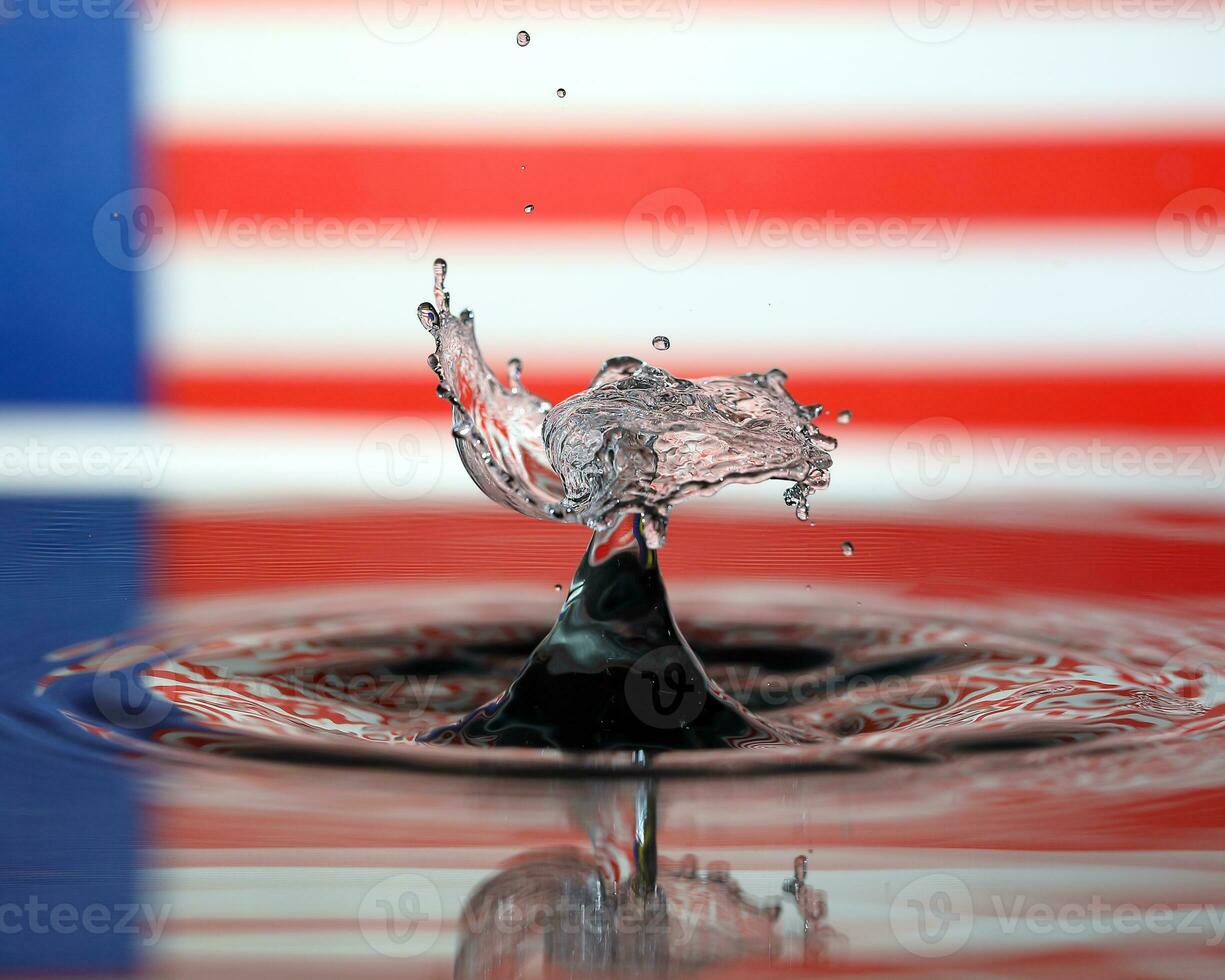 Water droplet drop splash collision dripping pillar Malaysia Flag reflection refraction independence country patriot photo