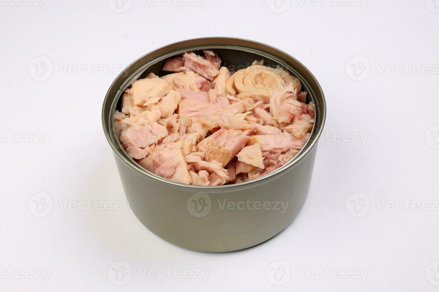 Tuna fish meat flaky chunk in tin can on white background 24319020 Stock Photo at Vecteezy
