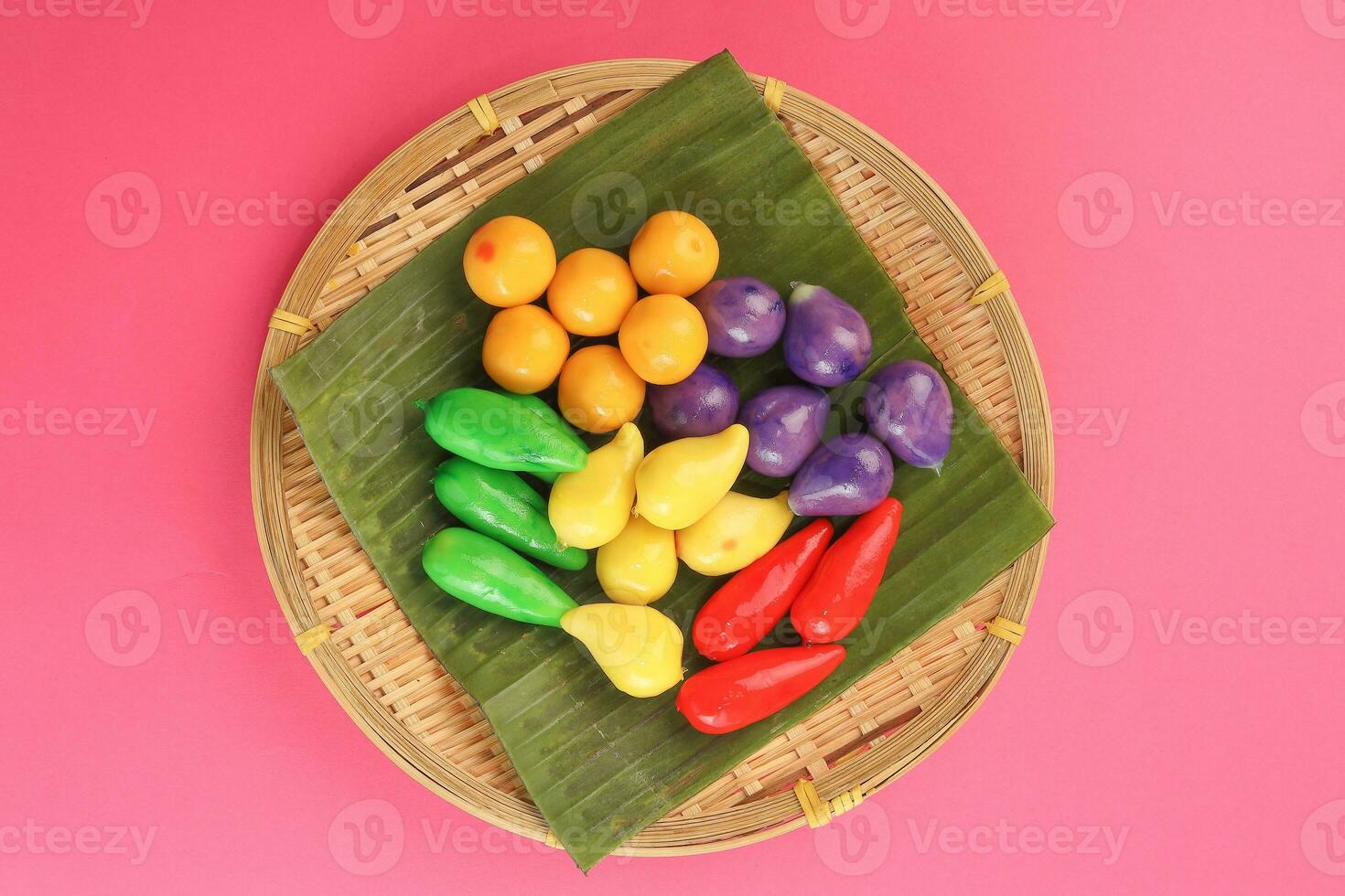 Colourful Luk chup look choop tadeonal Thai desert sweets candy creatve variety bamboo plate banana leaf photo